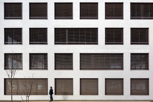 emmi-main office and apartment complex rüssli architekten