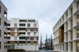 emmi-main office and apartment complex rüssli architekten